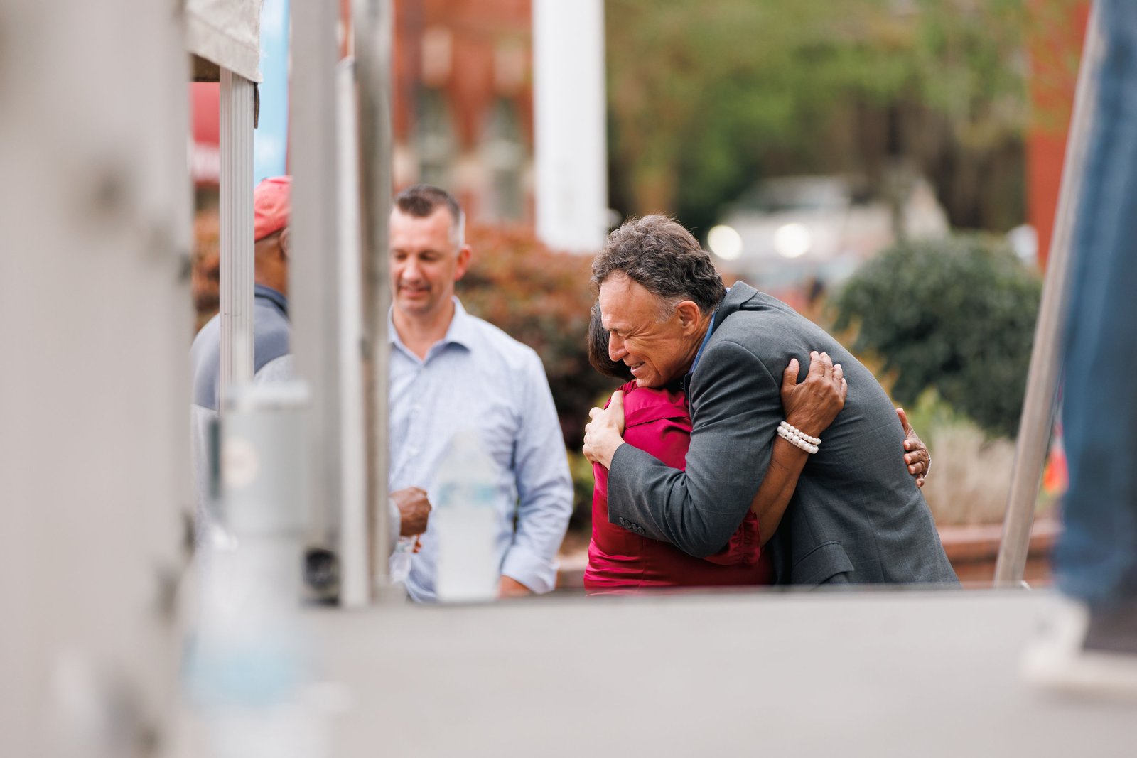 Bob praying with someone