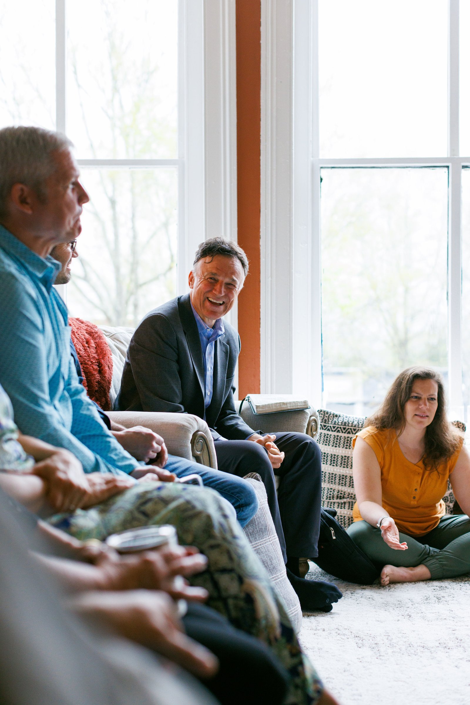 Bob with a group in prayer