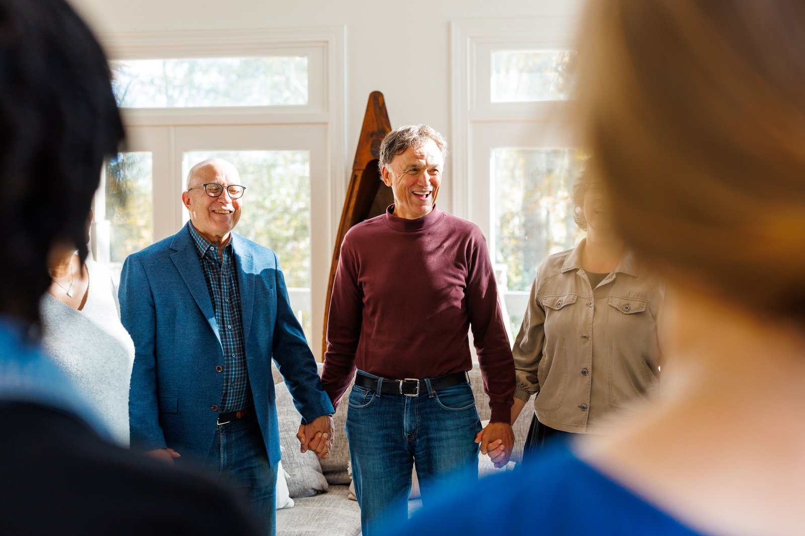 Bob praying with a group